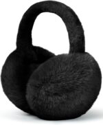 Close-up of black faux fur ear muffs, soft and fluffy, designed for winter warmth and comfort.