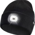Black Etsfmoa unisex beanie with an integrated LED light, shown on a person outdoors at night.