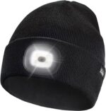 Black Etsfmoa unisex beanie with an integrated LED light, shown on a person outdoors at night.