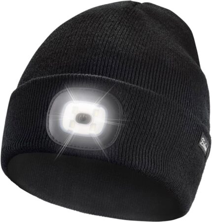 Black Etsfmoa unisex beanie with an integrated LED light, shown on a person outdoors at night.