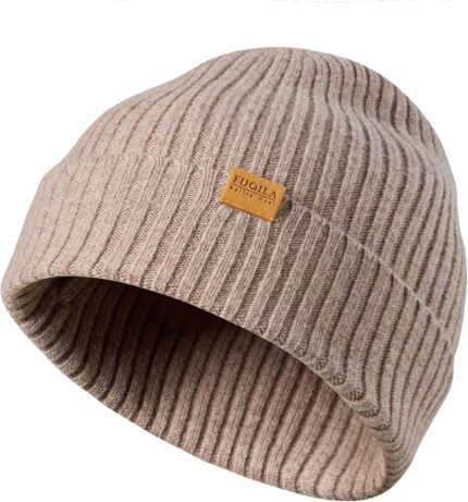 Close-up of a light camel 100% merino wool cuffed beanie hat, showcasing its soft knit texture.