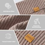 Close-up of a light camel 100% merino wool cuffed beanie hat, showcasing its soft knit texture.