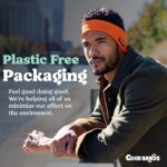 An orange Good Bands thermal fleece ear warmer headband, shown flat, ready for cold weather activities.