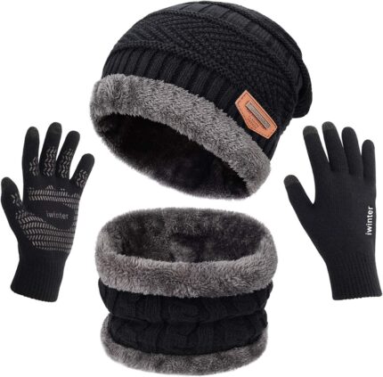 Black knit beanie hat, neck warmer scarf, and touchscreen gloves set for men and women on a plain background