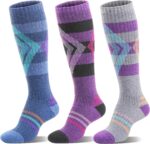 Three pairs of striped Welwoos Merino wool thermal ski socks in blue, purple, and grey, folded neatly.