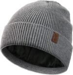Close-up of a Wmcaps Winter Beanie, showcasing its soft knit texture and warm fleece lining