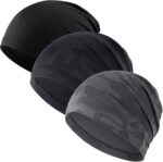 Three WTACTFUL skull caps in black, camo black, and camo gray, folded neatly on a plain background.